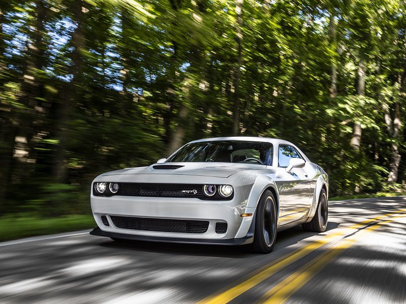 Dodge Challenger Hellcat Widebody front driving white ・  Photo by Dodge 