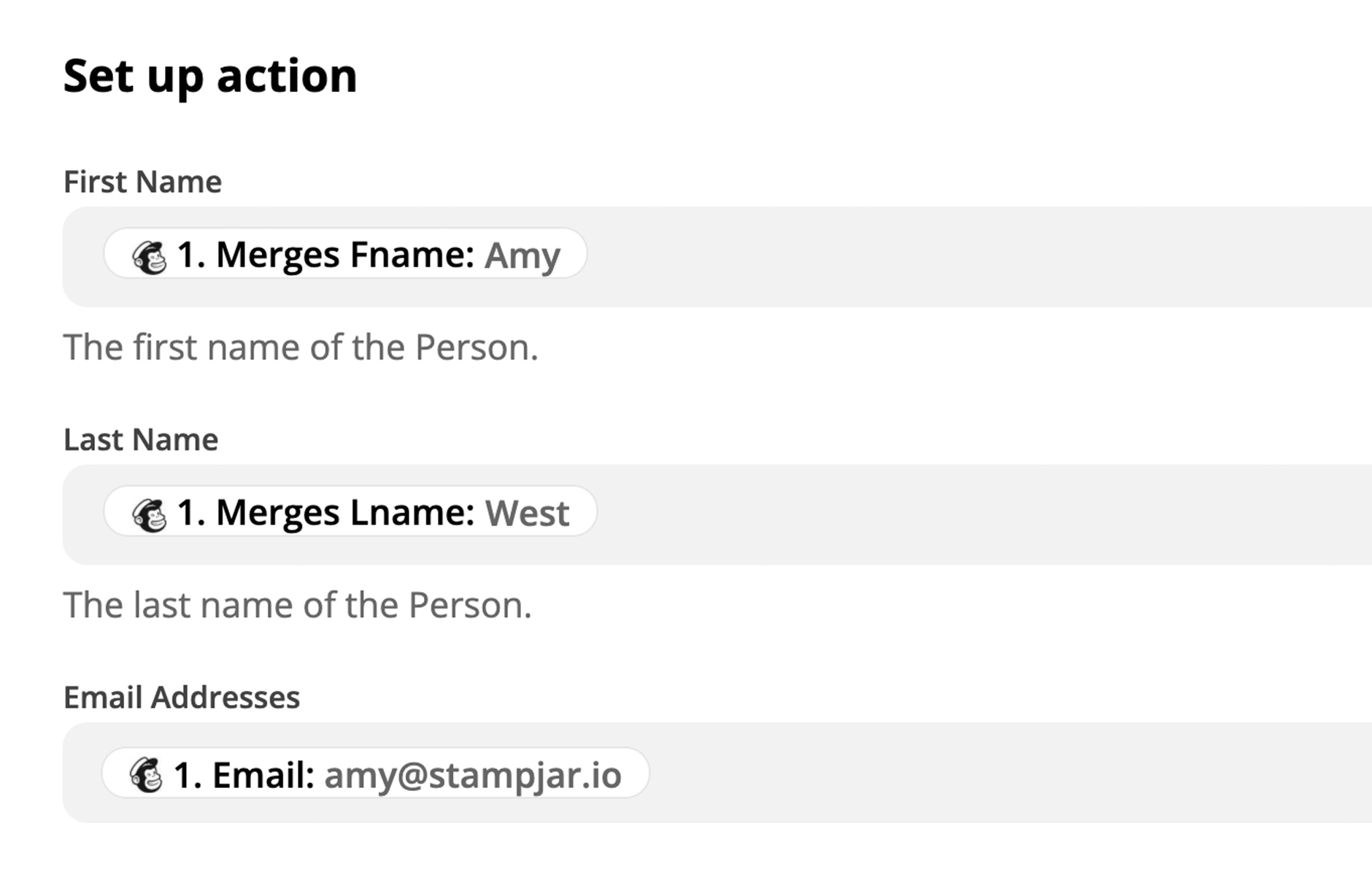 A Mailchimp trigger is being configured in Zapier, with name and email address values being pulled from step 1 of the Zap