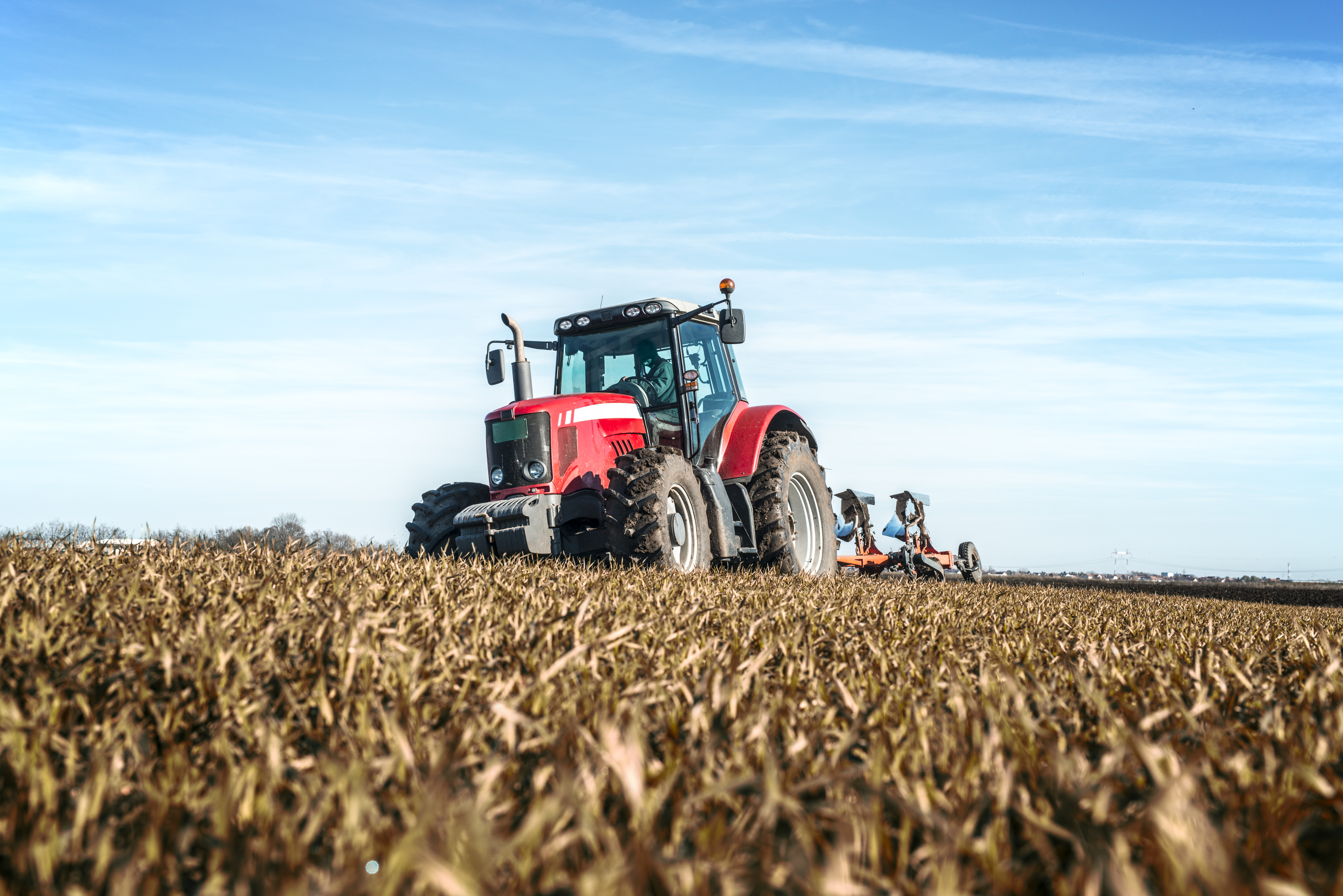 tractor-agricultural-machine-cultivating-field.jpg