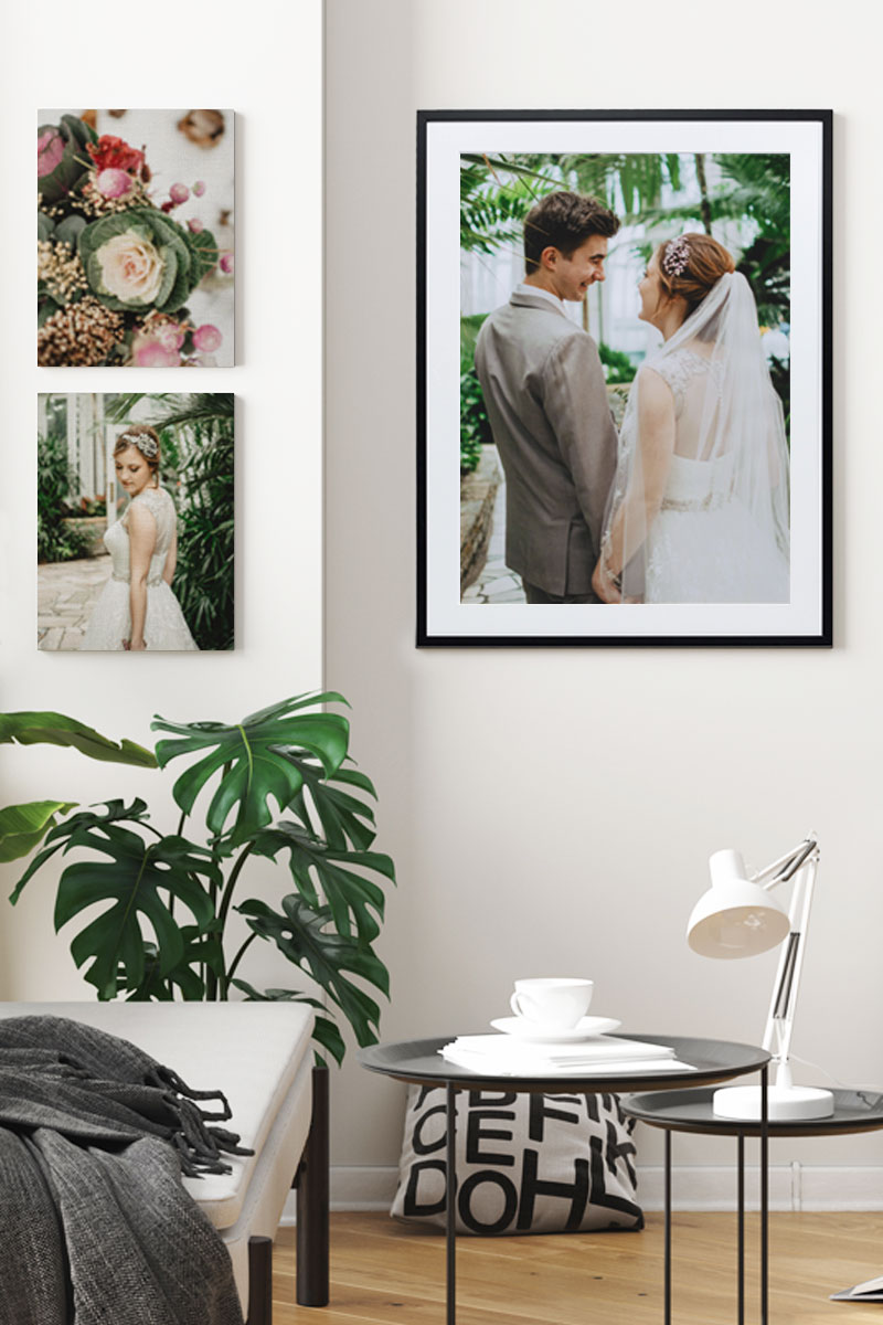 Gallery wall of framed and canvas wedding prints