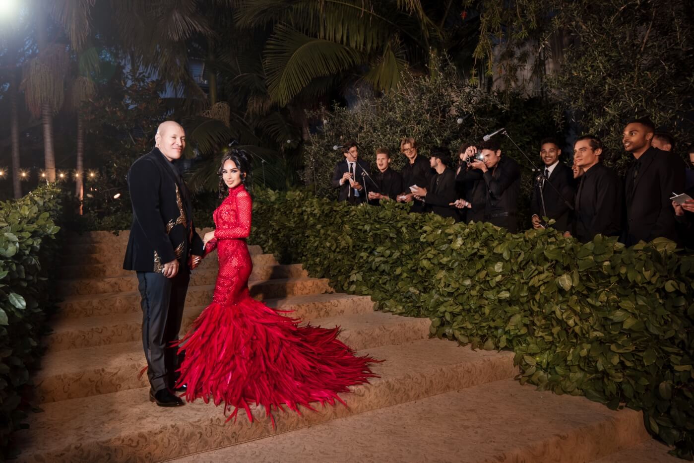 red dress and black tux