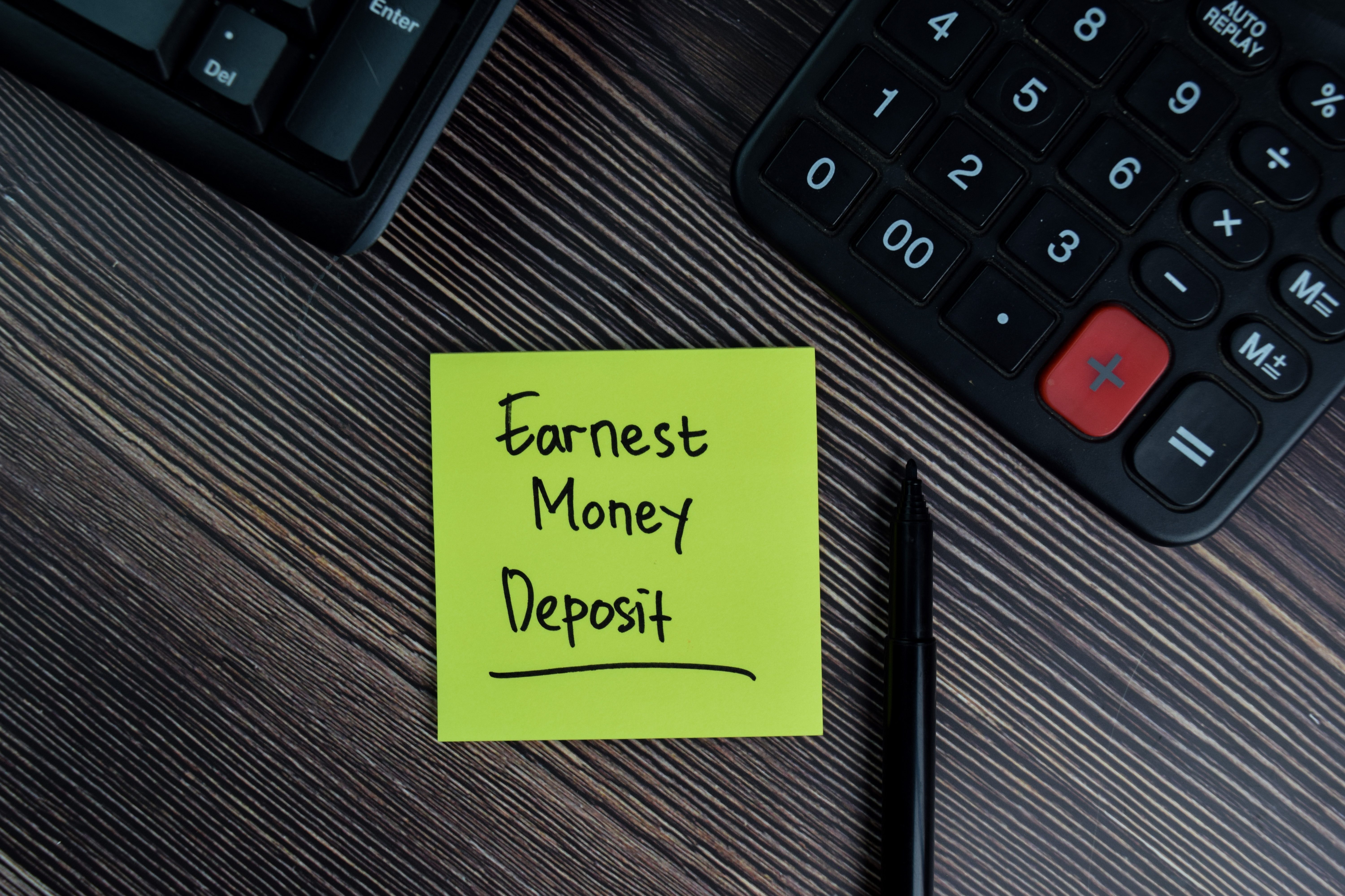 Earnest Money Deposits written on a sticky note