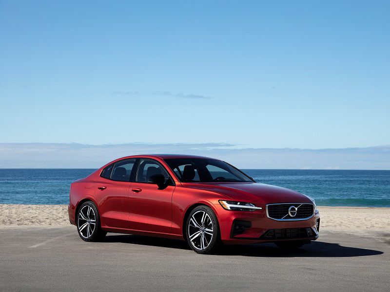 2019 Volvo S60 Red Parked Beach Front Quarter ・  Photo by Vovlo
