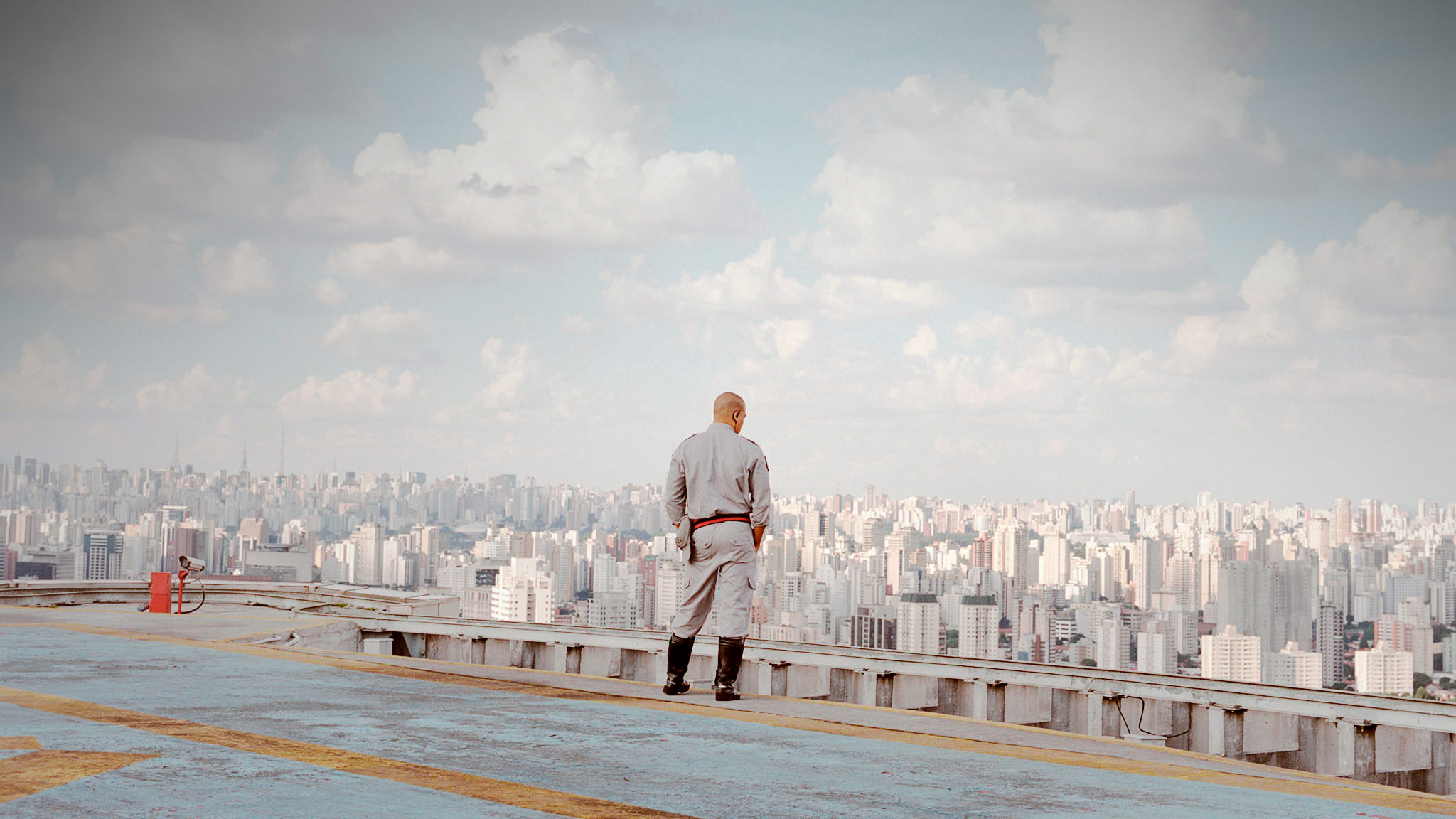 Photo of a man standing on skyscraper roof in Sao Paolo