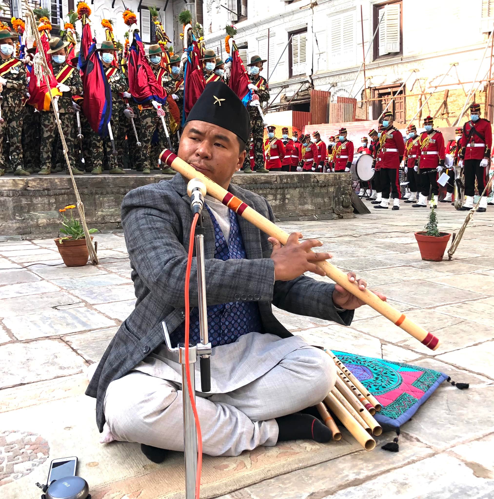 Dhan Bahadur Gurung_playing flute.jpg