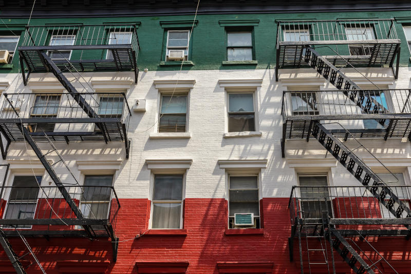 Exterior of building in Little Italy painted like Italian flag.