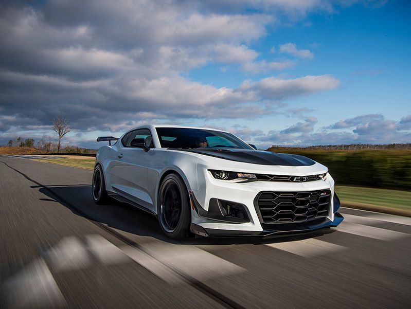 2018 Chevrolet Camaro ZL1 1LE white front three quarter in motion ・  Photo by General Motors