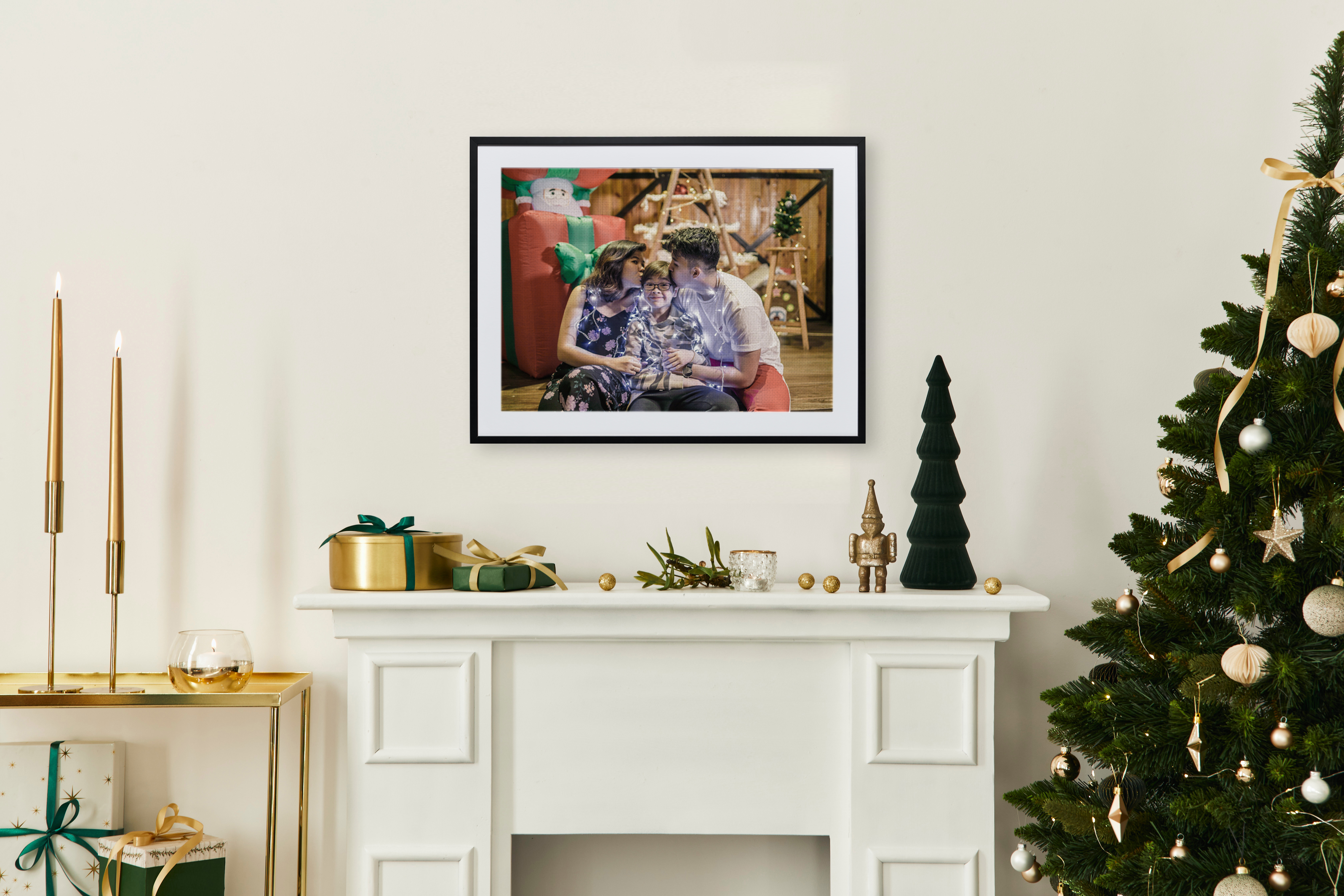 Framed print of Christmas family photo in living room