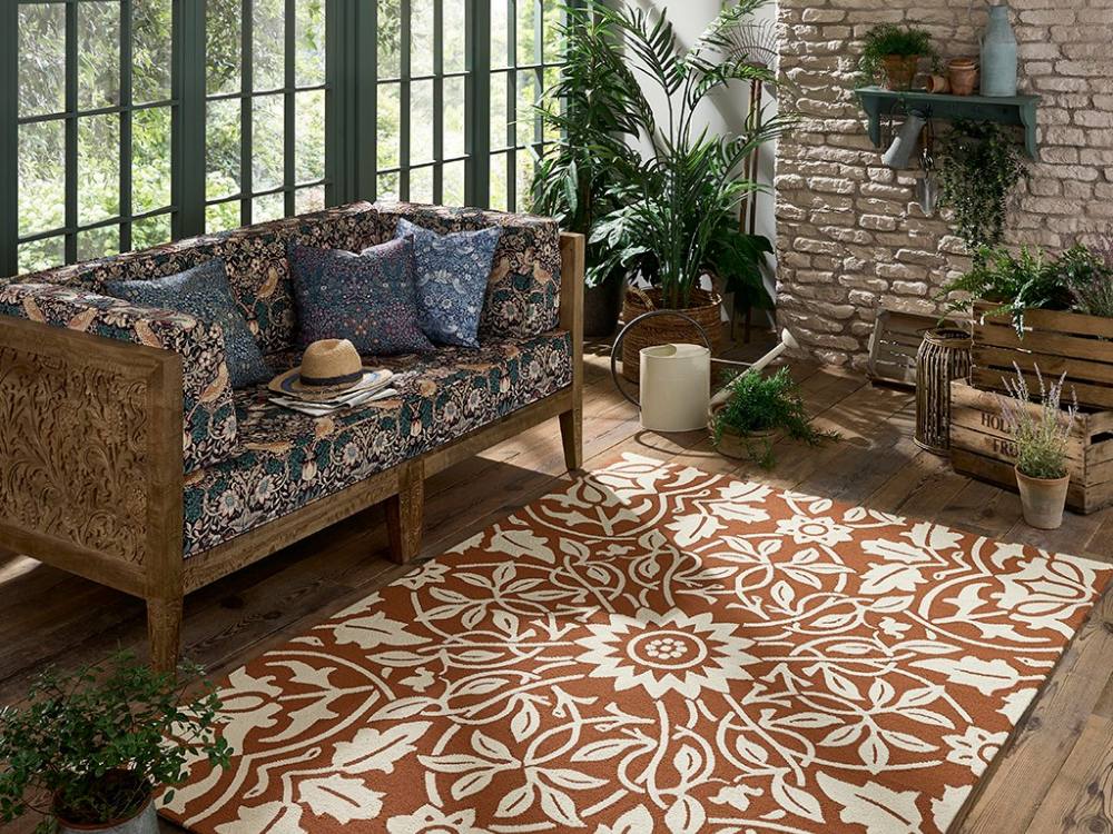 Autumn Interior Design Trends 2022 Morris & Co Rug with Patterned Sofa