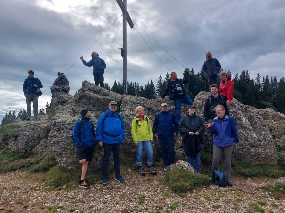 Hiking group at the summit cross