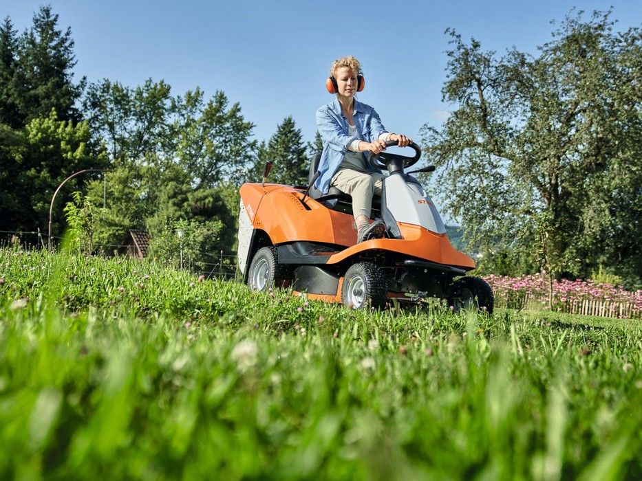 Woman mowing with Stihl RT4082 ride-on mower