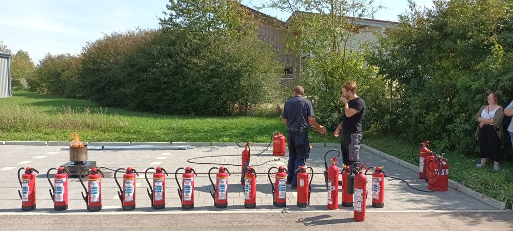 Lined up fire extinguishers