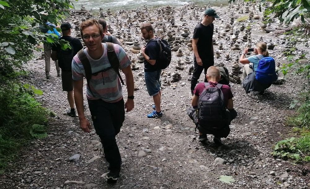 Hiking group by the river