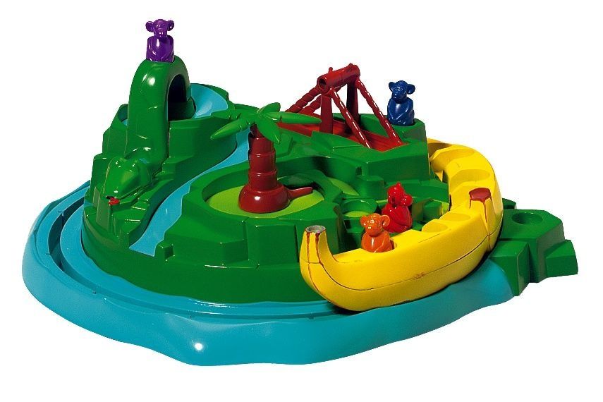 Game set-up with island and banana boat with colorful monkeys on it