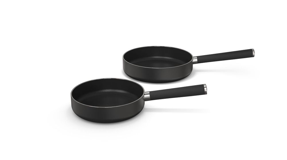 Two anthracite-colored pans in an ensemble, freestanding.