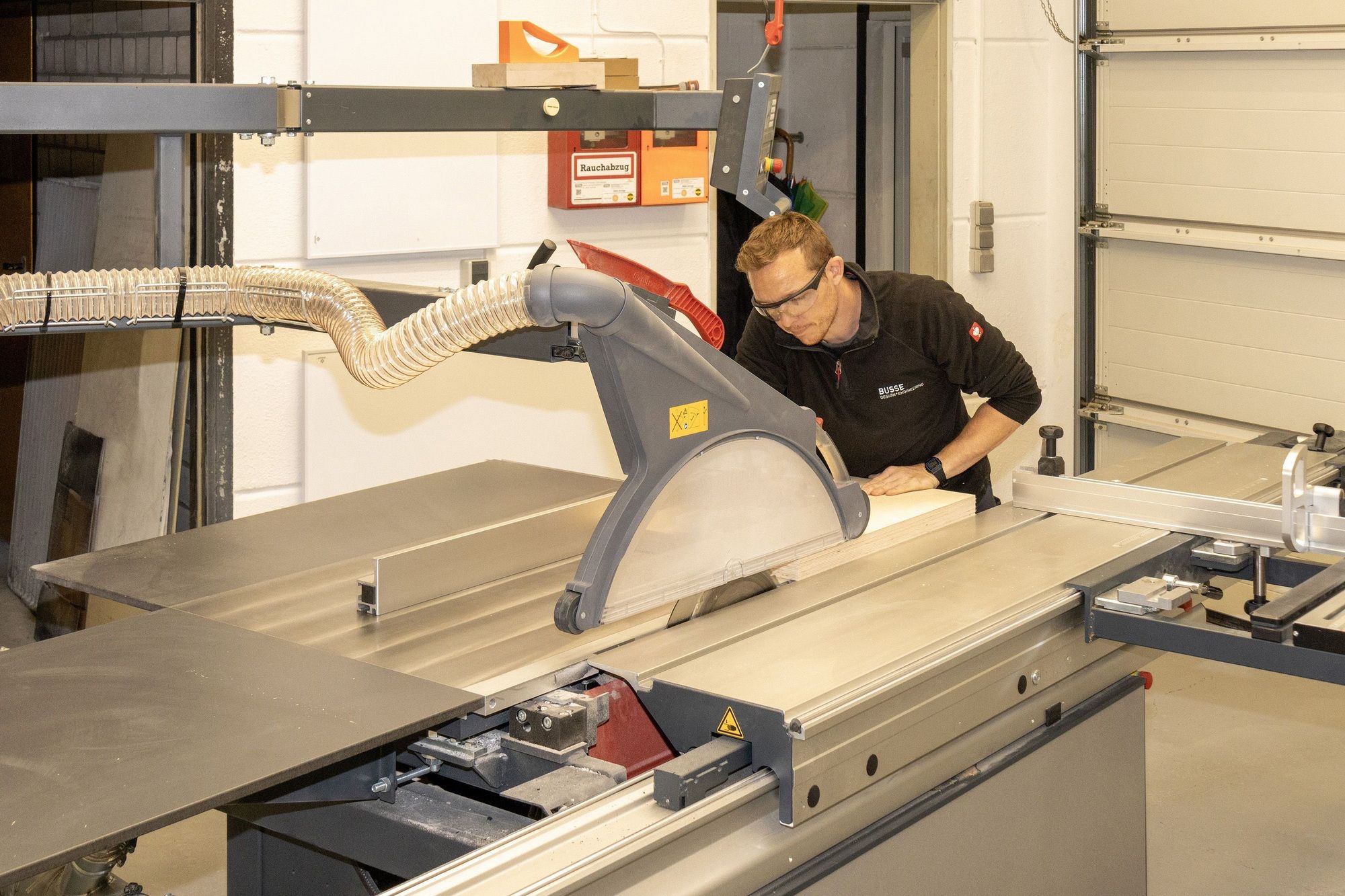 Man standing at a circular saw