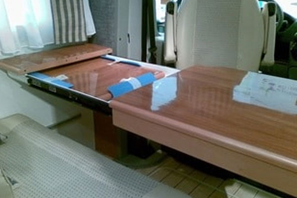 In this caravan the table extension is mounted on black finish 3832 cabinet slides.