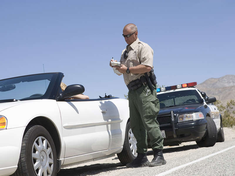 white convertible getting ticket 