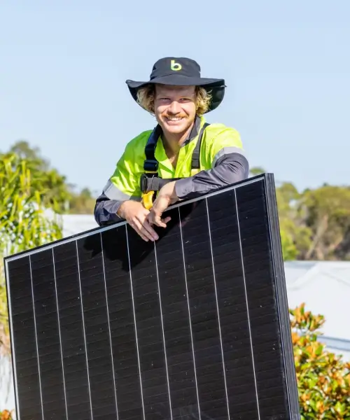 Vendor holding a solar panel