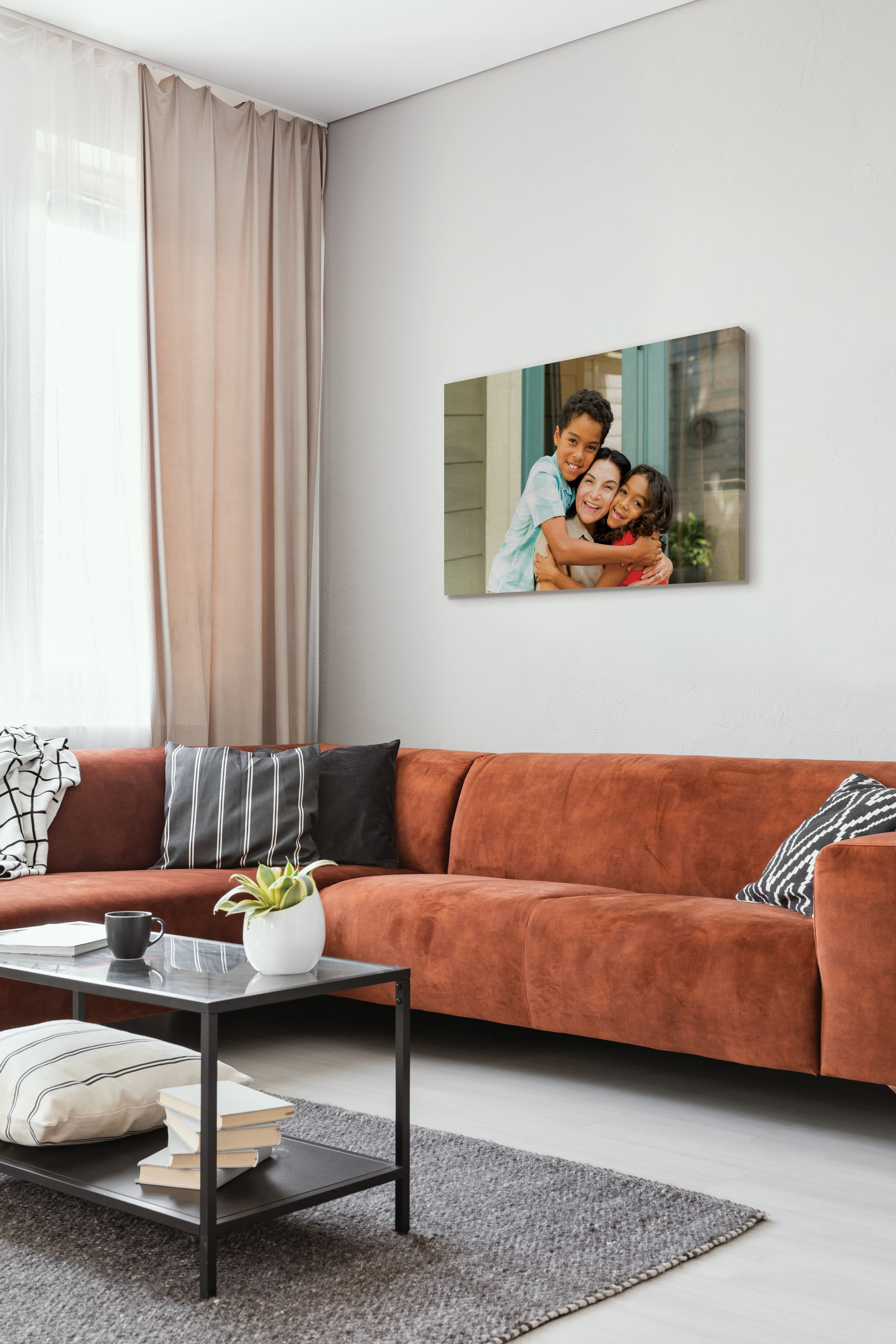 Canvas print in living room of grandmother with her grandchildren