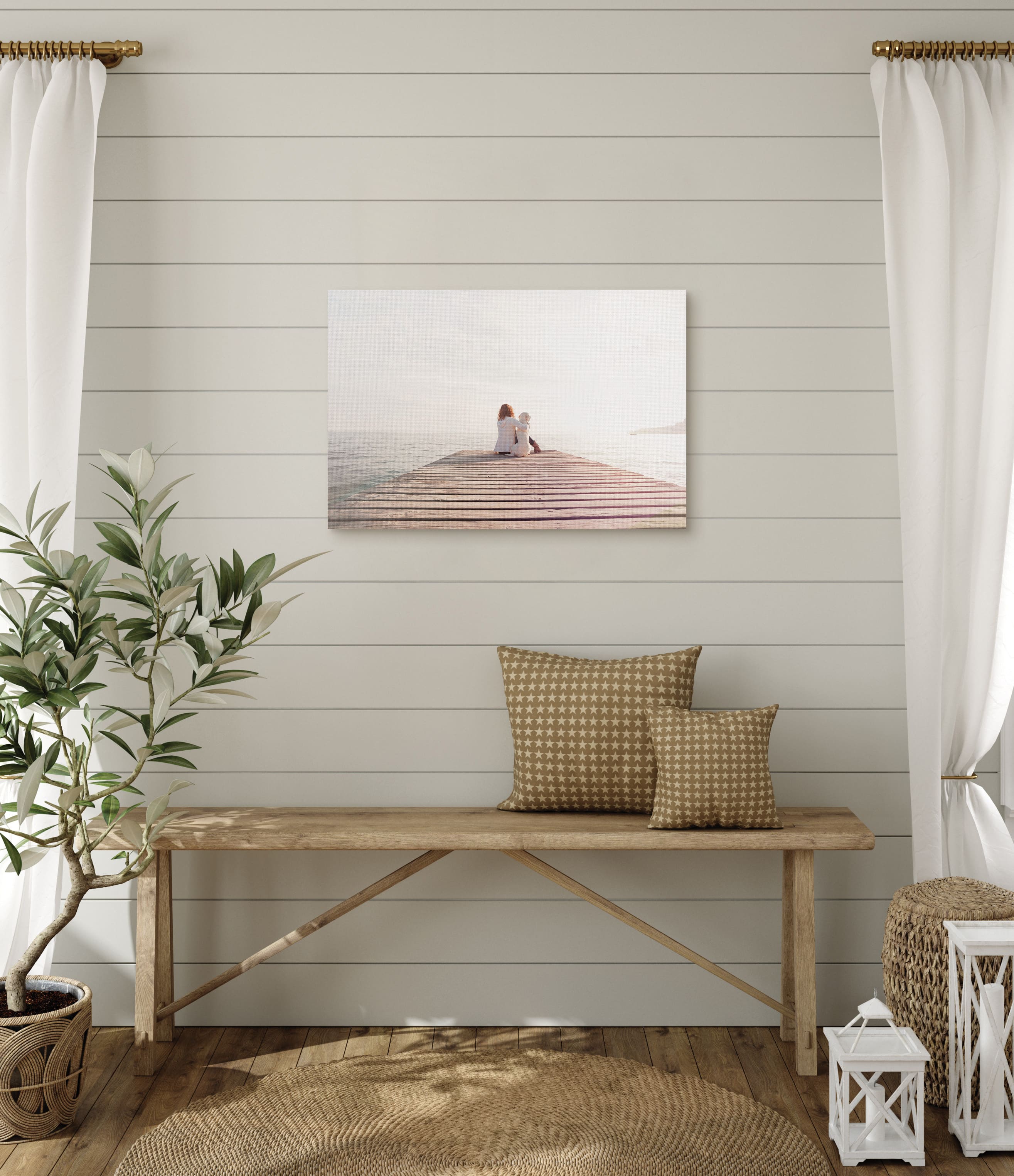 Canvas print in living room of woman and dog by the pier.
