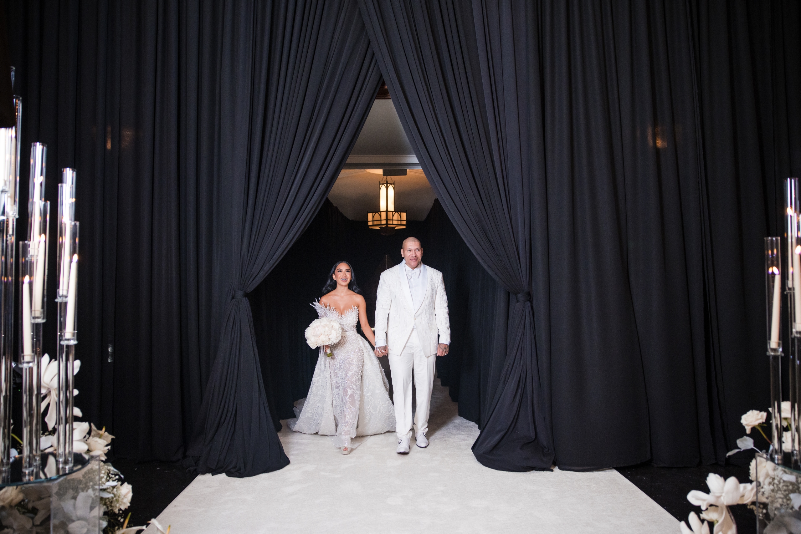 Wife and husband walking down aisle