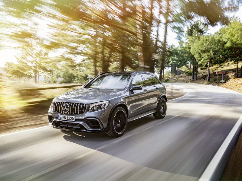 2018 Mercedes AMG GLC63 Grey Driving Front Quarter ・  Photo by Mercedes-AMG