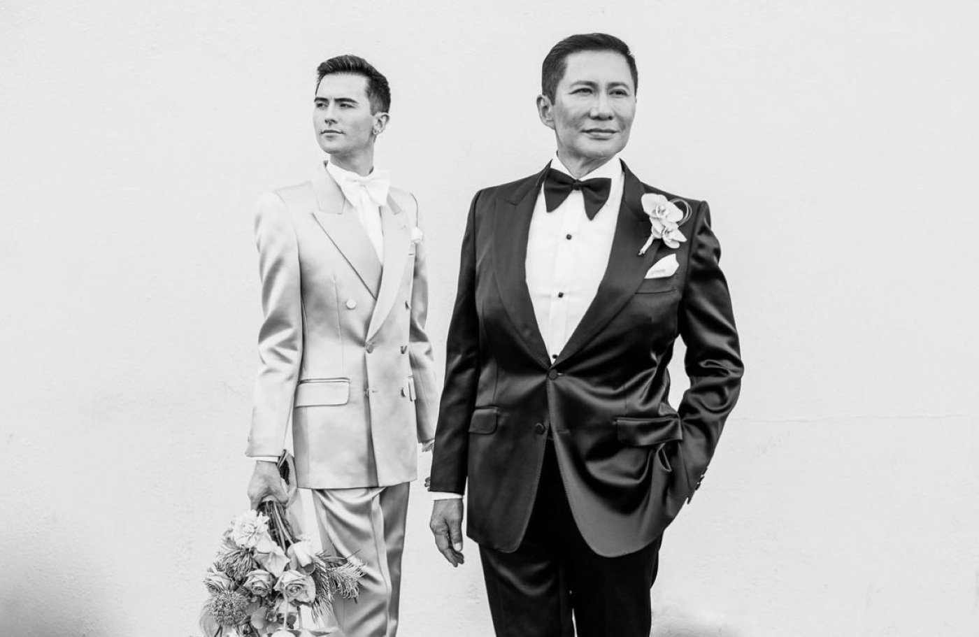 two grooms on their wedding day in black and white photo