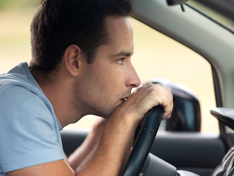 bigstock man thinking in his car ・  Photo by Bigstock 