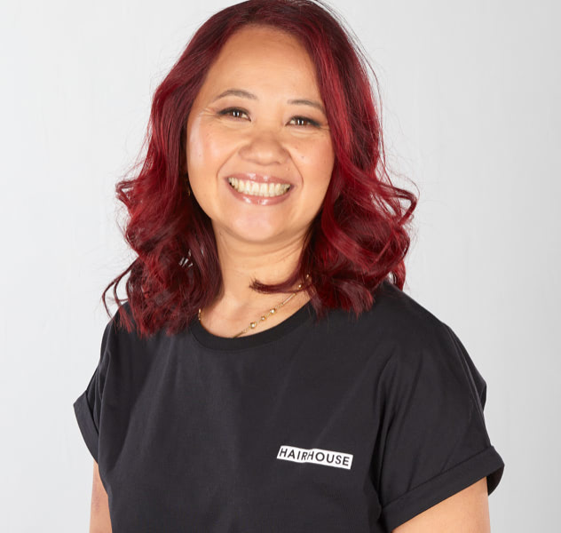 Hairhouse salon employee with red hair