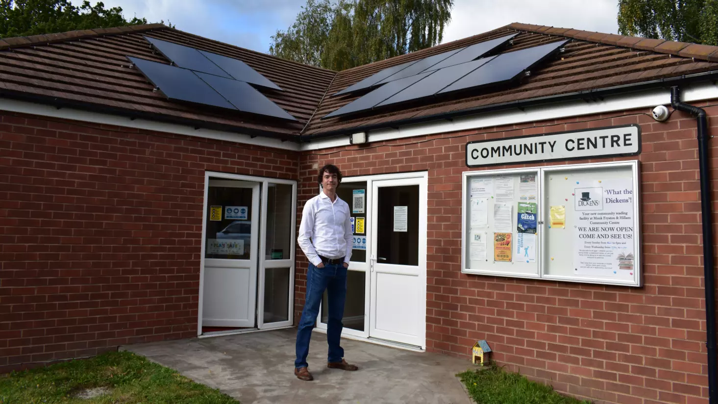 Jon with his insulation and solar PV project for a community centre
