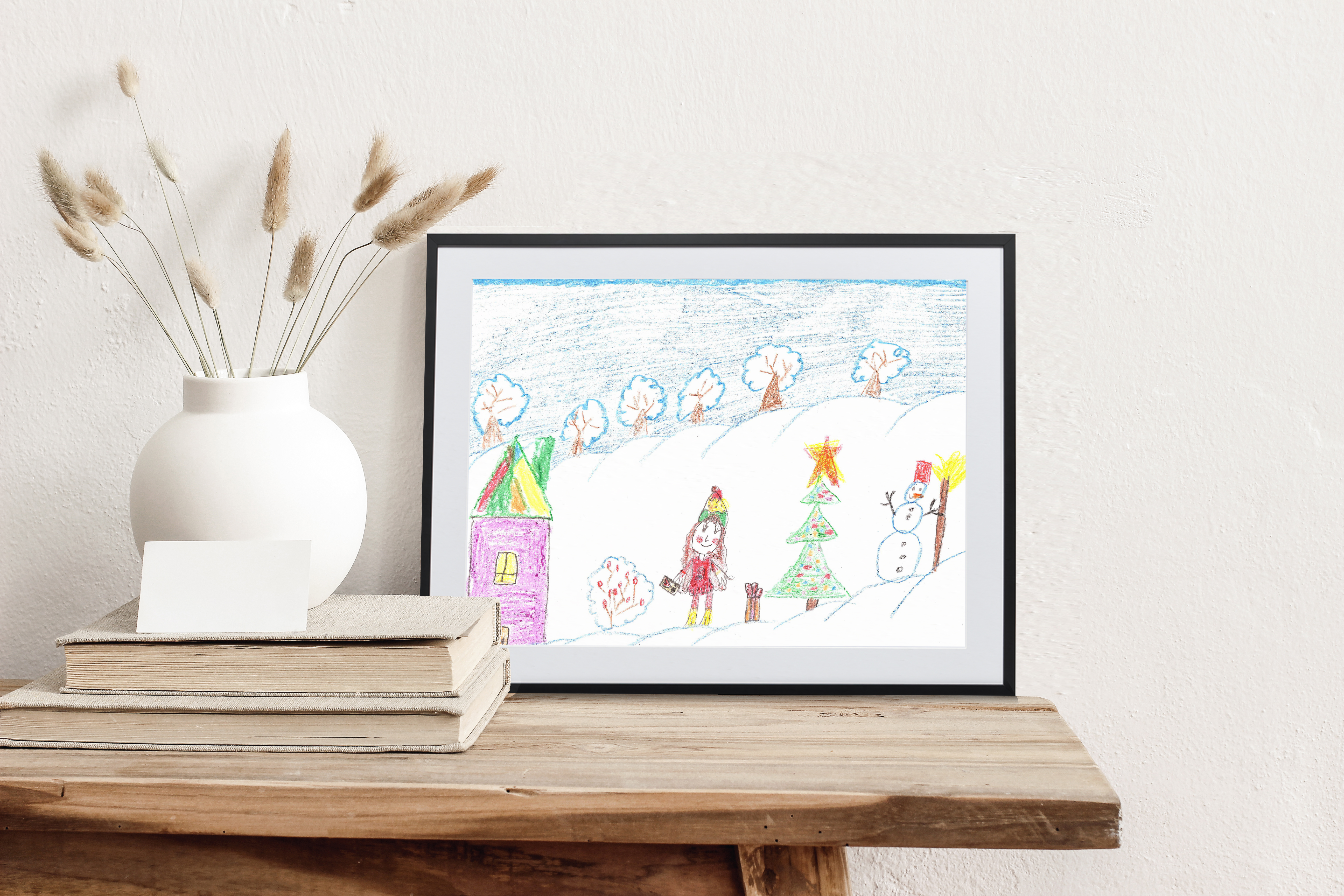 Framed children's holiday artwork