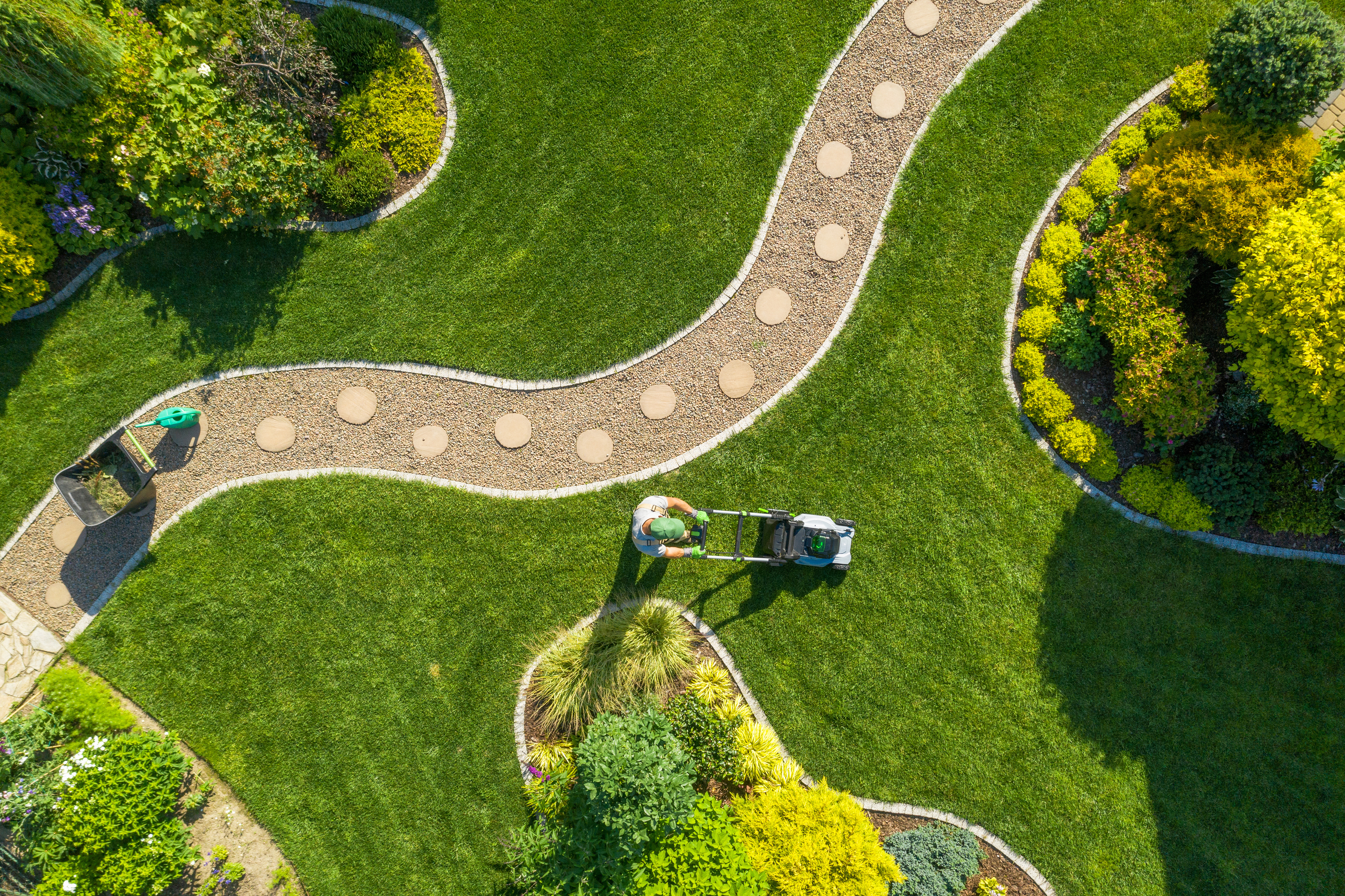 Big Garden Grass Field Mowing by Gardener