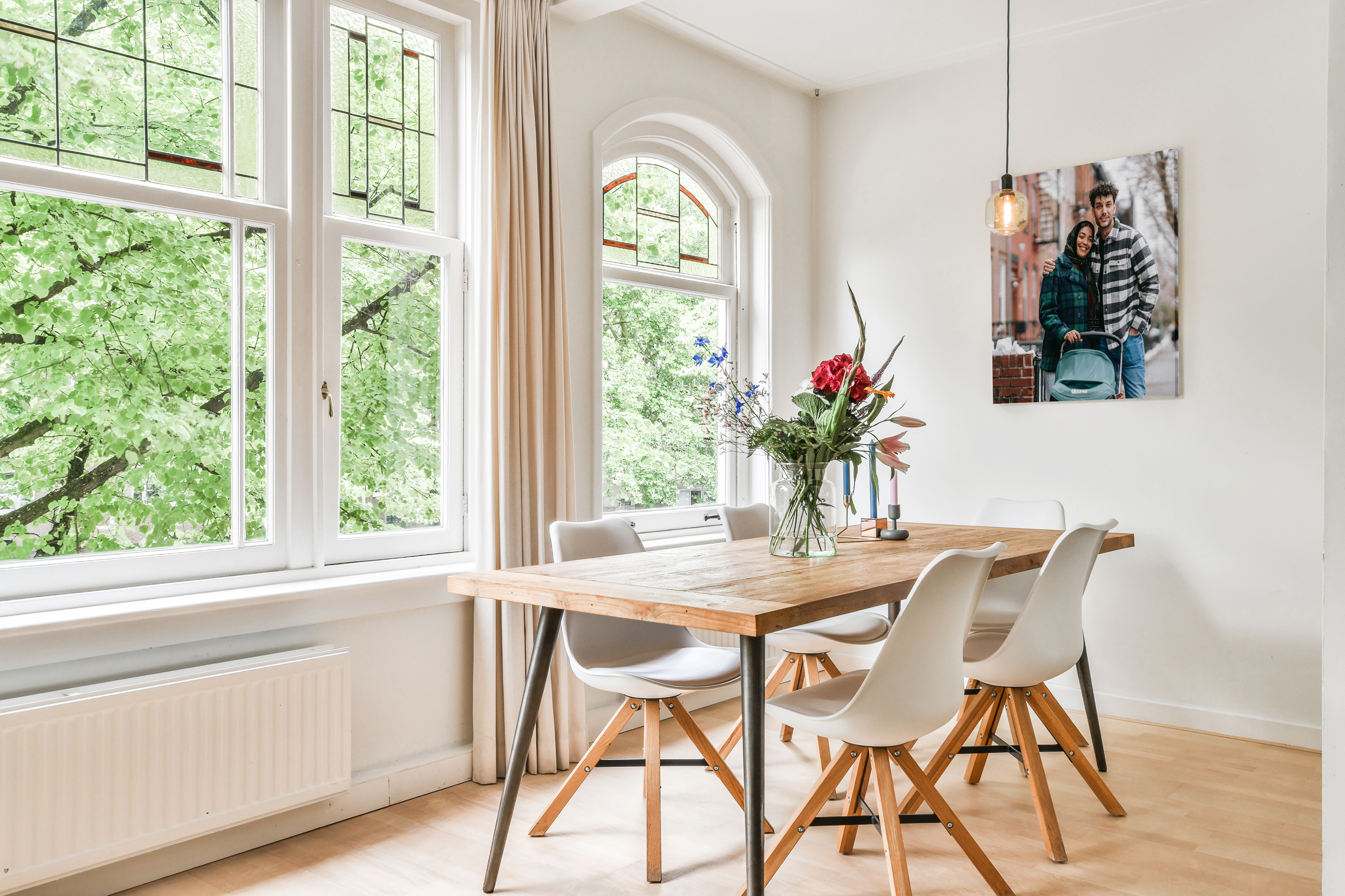 Canvas print in dining room of couple