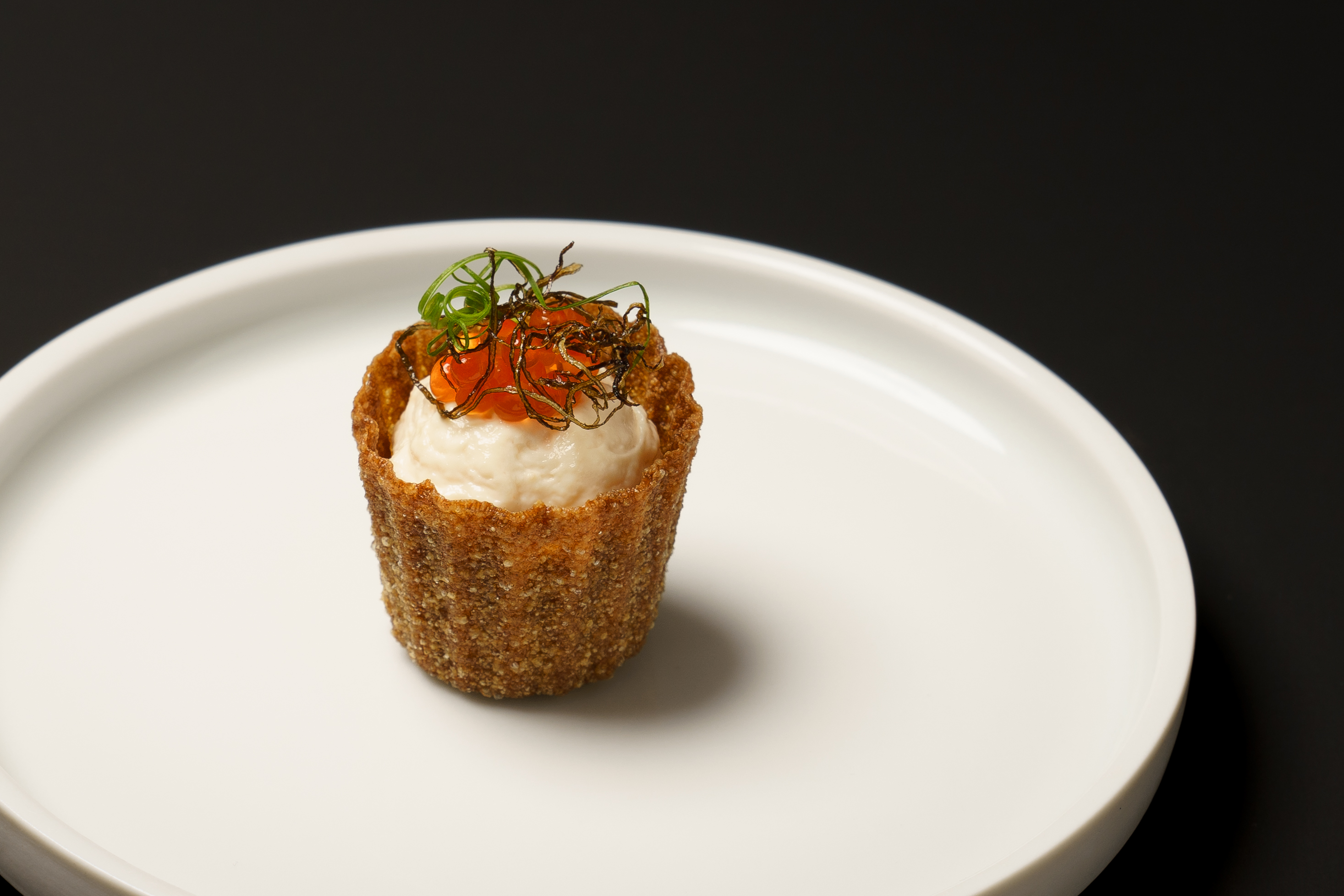 Croustade of whipped smoked cods' roe, trout roe, crispy kombu, chive