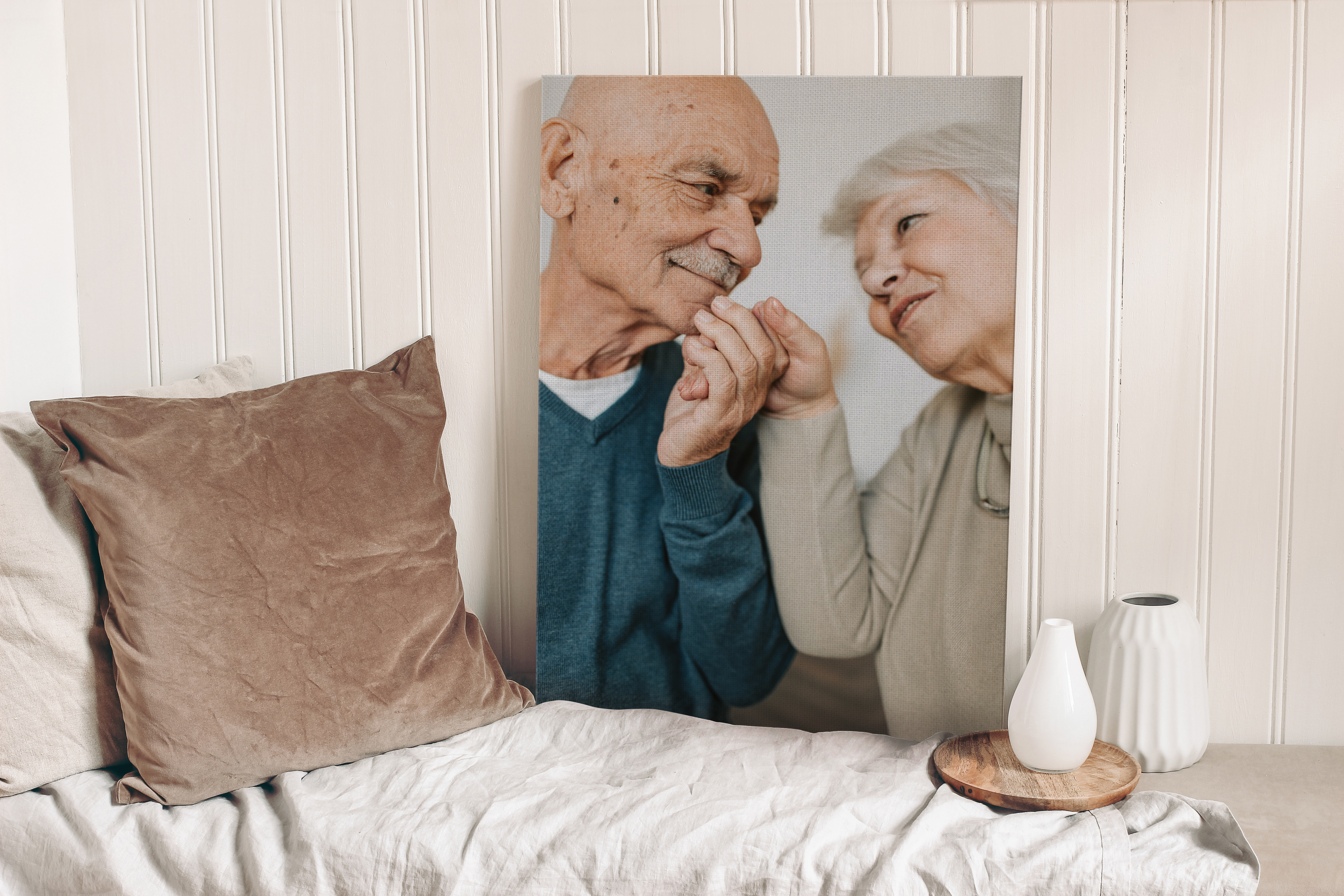 Product shot of canvas print of elderly couple holding hands