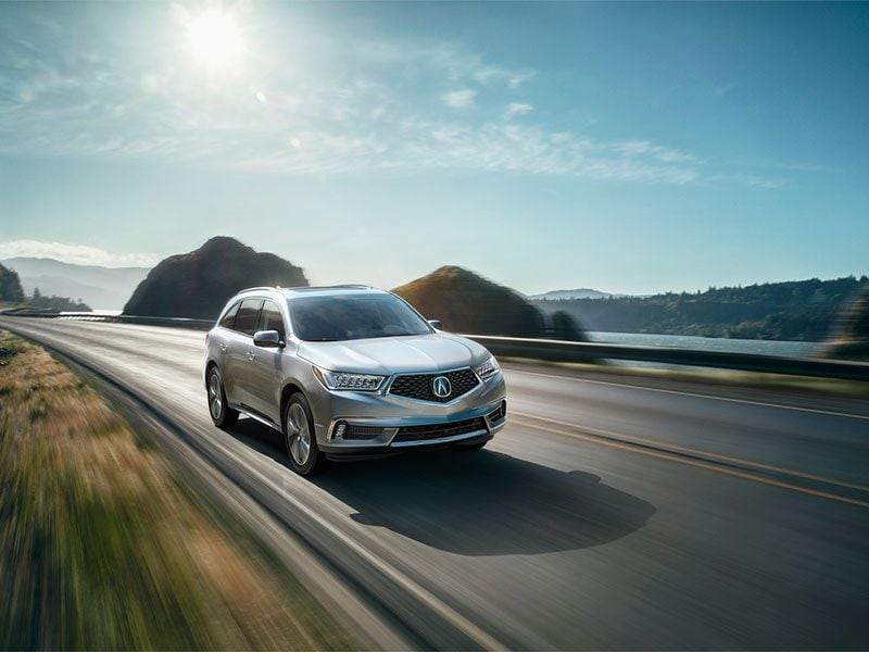 2017 Acura MDX exterior on road ・  Photo by Acura 