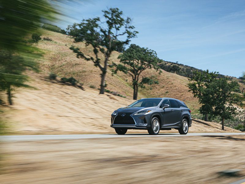 2020 Lexus RX 450hL Grey Driving Front Three Quarter ・  Photo by Lexus 