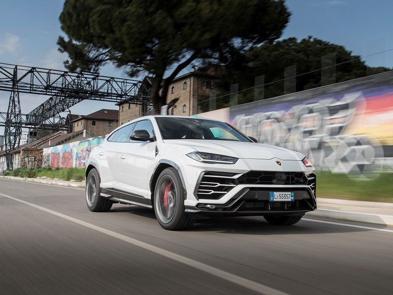 2019 Lamborghini Urus White Driving Front Three Quarter ・  Photo by Lamborghini 