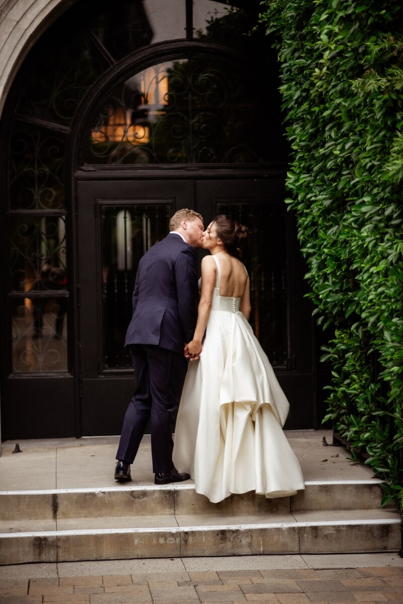 Bride and groom embracing