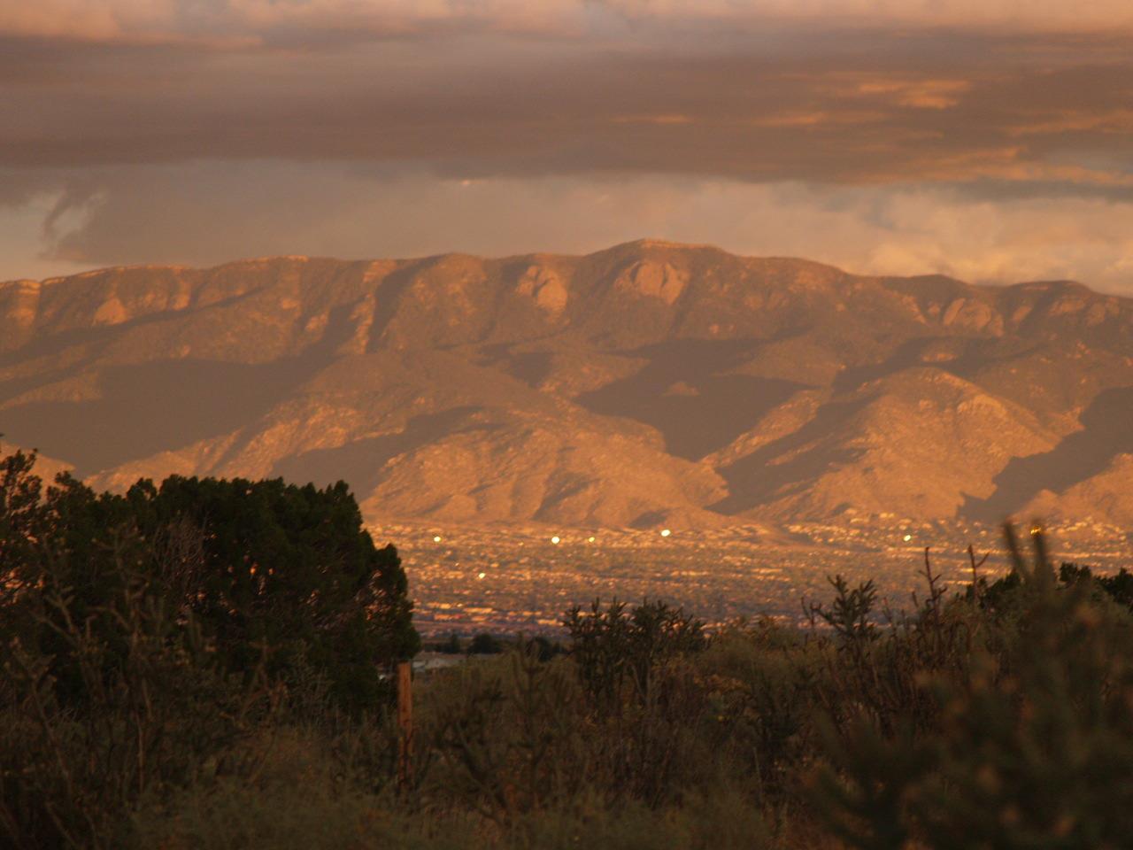 A sunset photo where the mountains are the main focus in the background