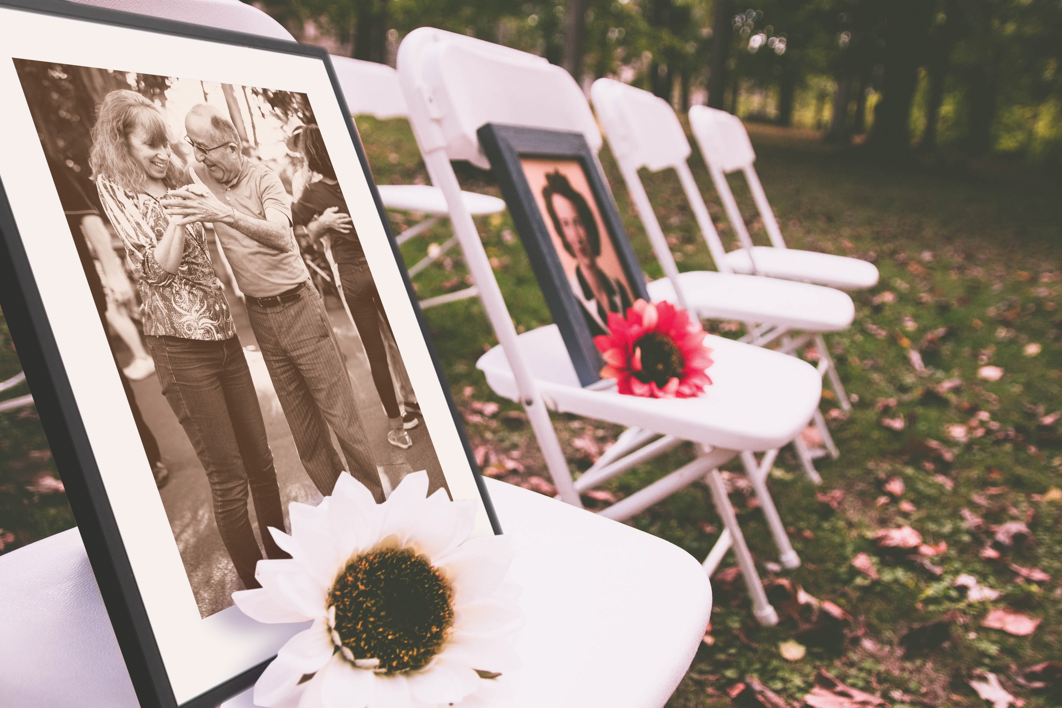 Framed print of old couple placed on a chair