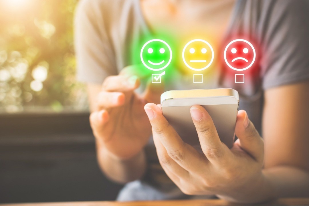 Rating customer satisfaction using a mobile phone