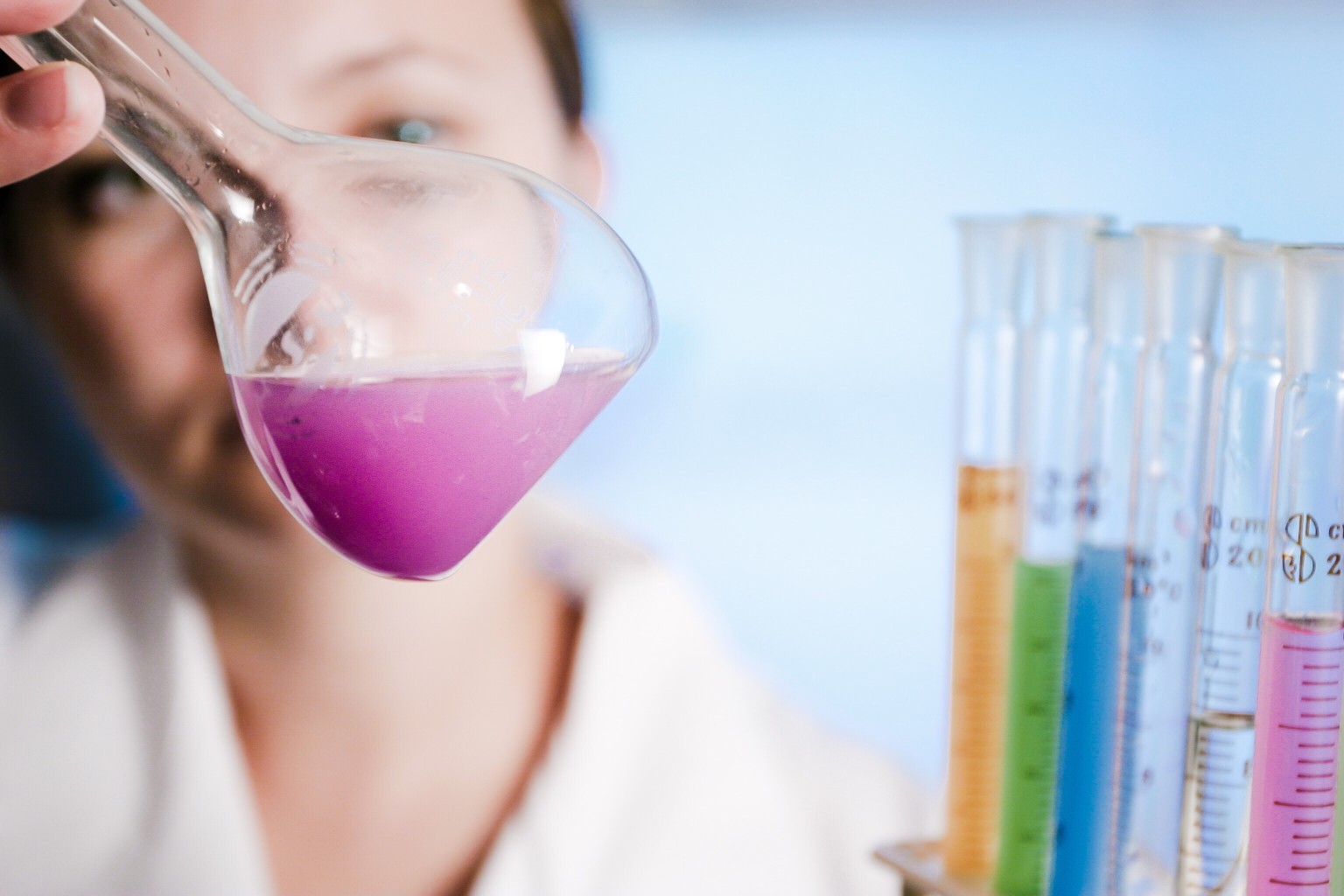 chemistry-and-science-woman-holding-a-flask-with-fluid-chemical-scientist-chemical-industry_t20_lW1mm2.jpg