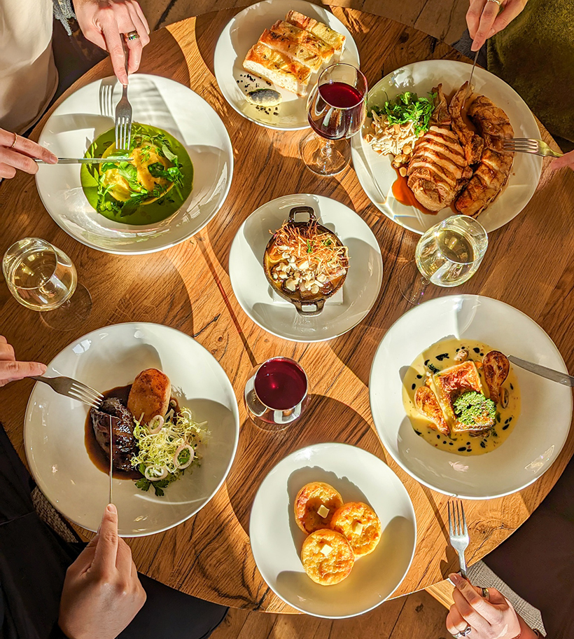 Clockwise from above: beef cheek, turnip, celery; potato ricotta ravioli, watercress;
pork chop, rémoulade, mustard leaf, hazelnuts; and hake, Jerusalem artichokes, mussels, green sauce. Centre: leeks, Parmesan, brazil nuts