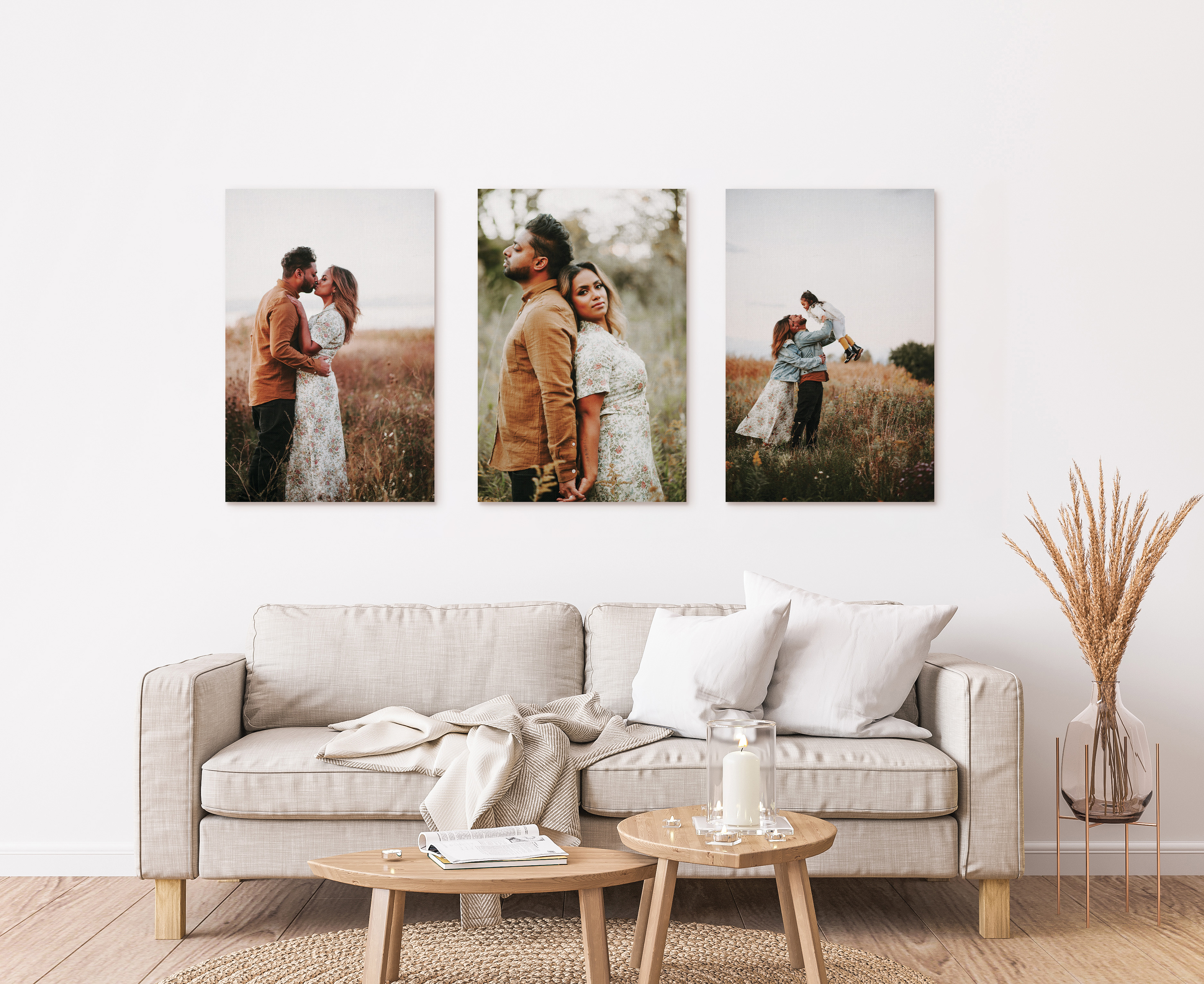 Three canvas prints of family in living room