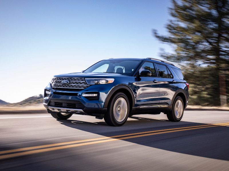 2020 Ford Explorer Limited blue driving ・  Photo by Ford 