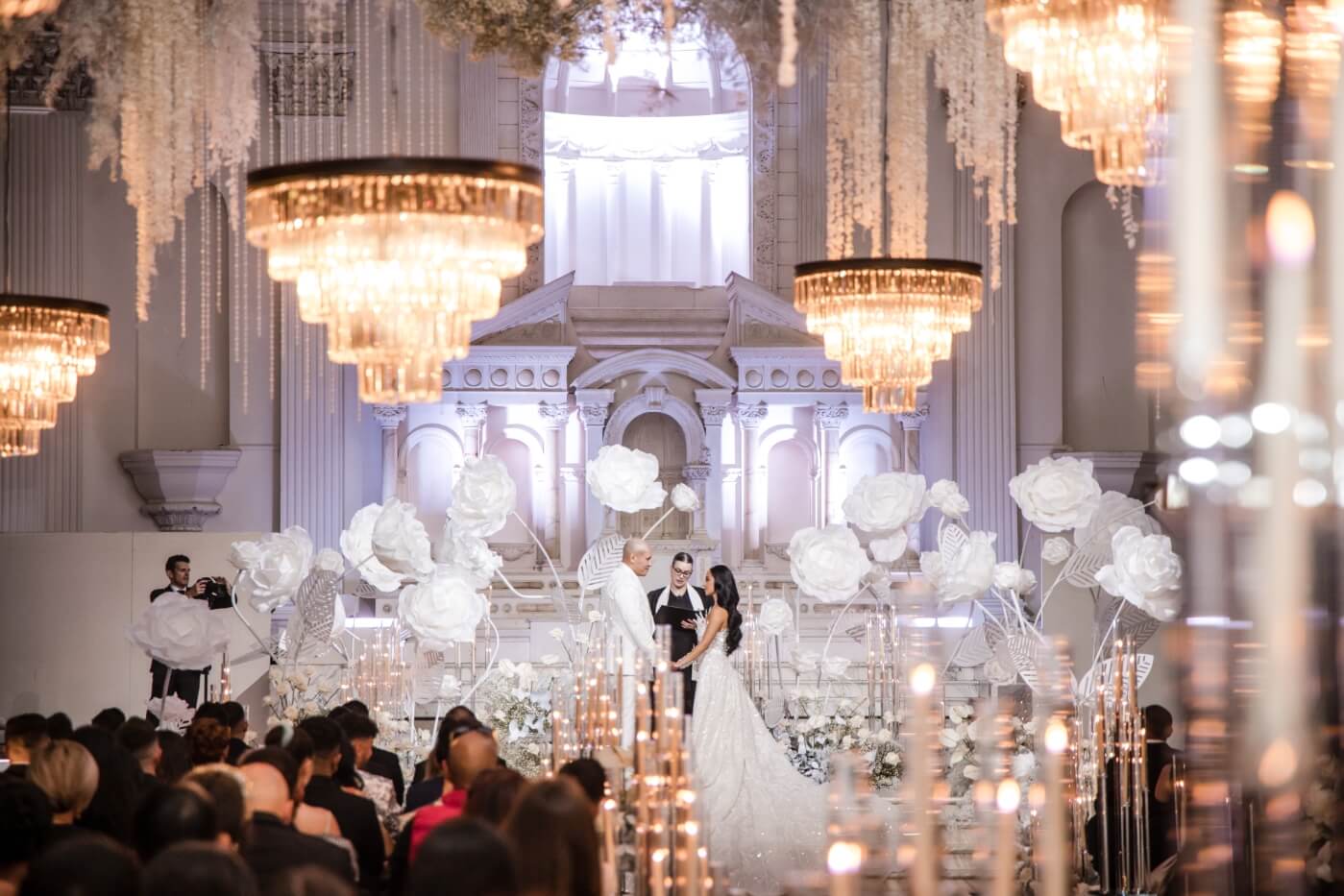 bride groom in front of altar 