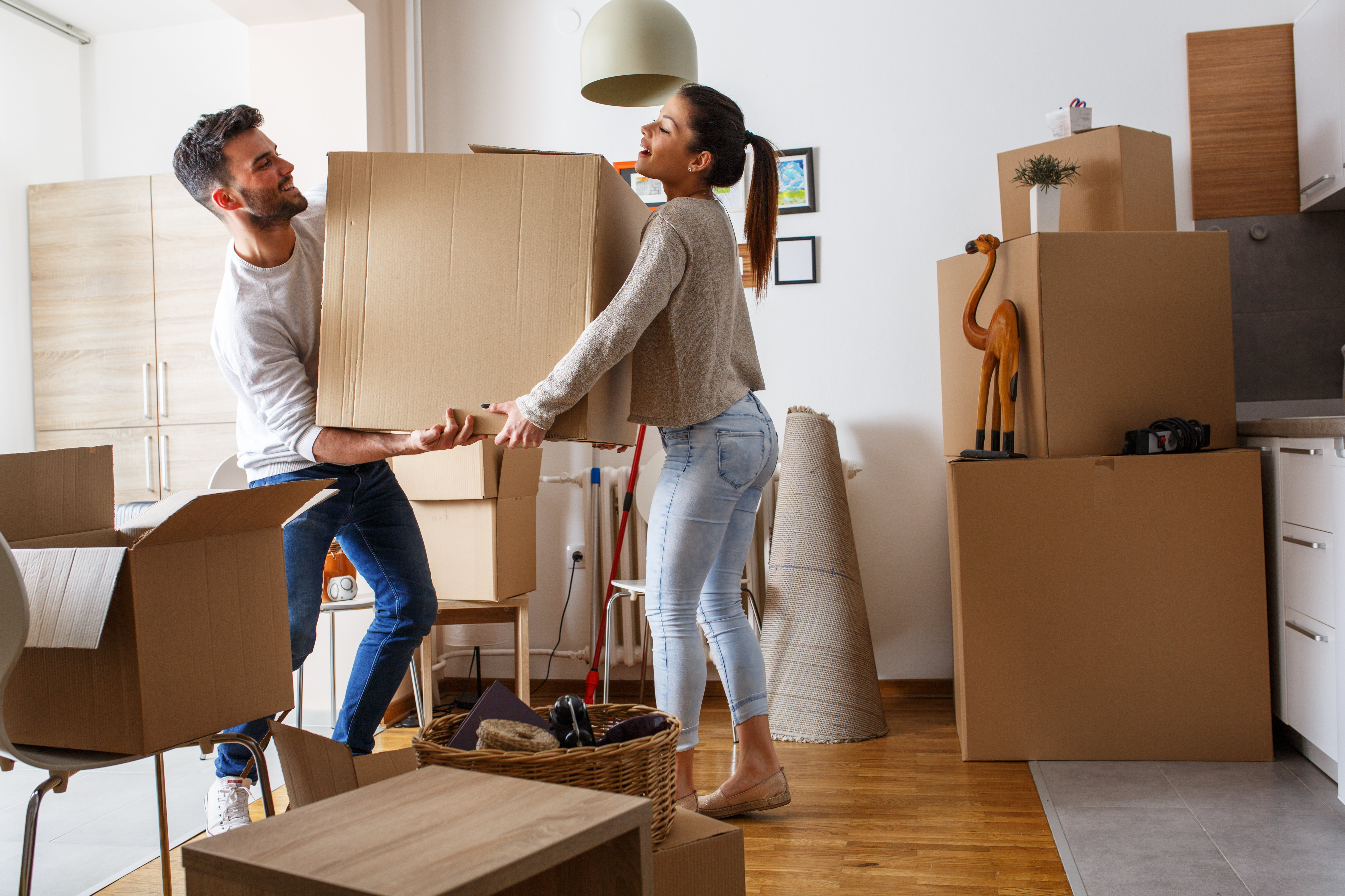 Couple unpacking their belongings