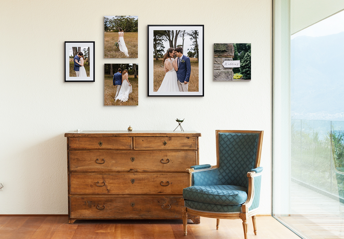 Gallery wall of framed and canvas prints of wedding